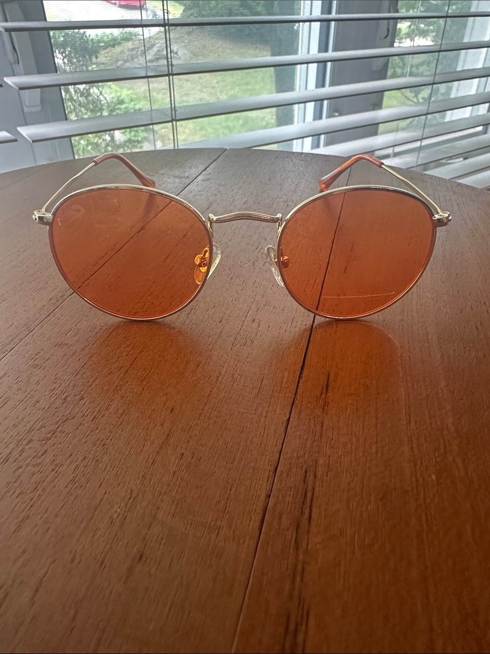 Rainbow Optx Round Sunglasses with Orange Lenses